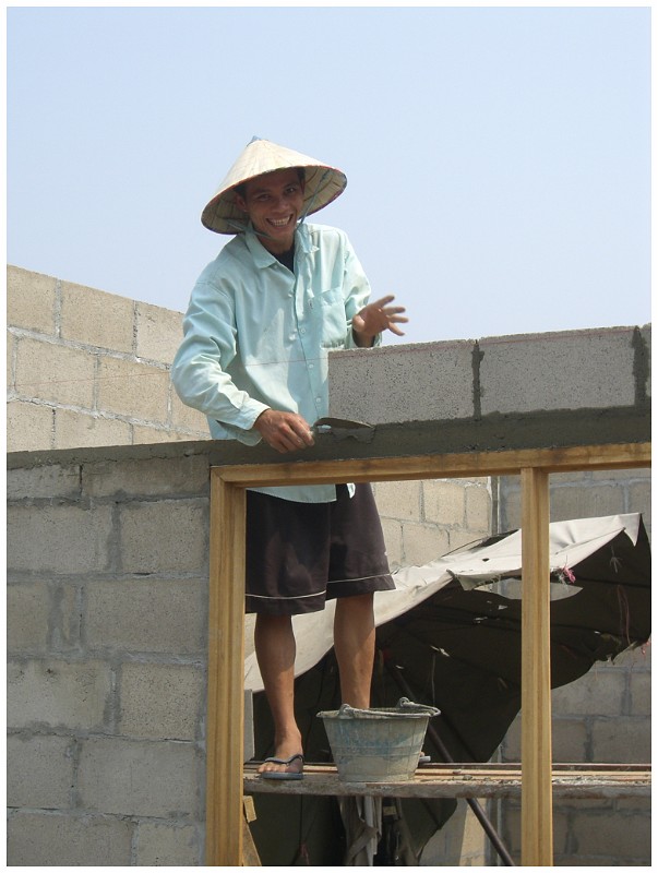 Happy Brick Layer, Laos.JPG